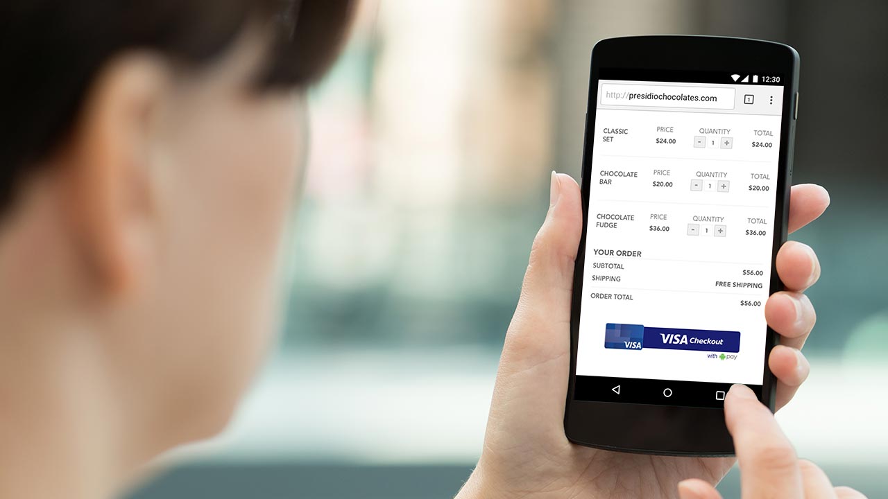 Online shopping on a mobile phone using Visa Checkout. Online shopping on a mobile phone using Visa Checkout.