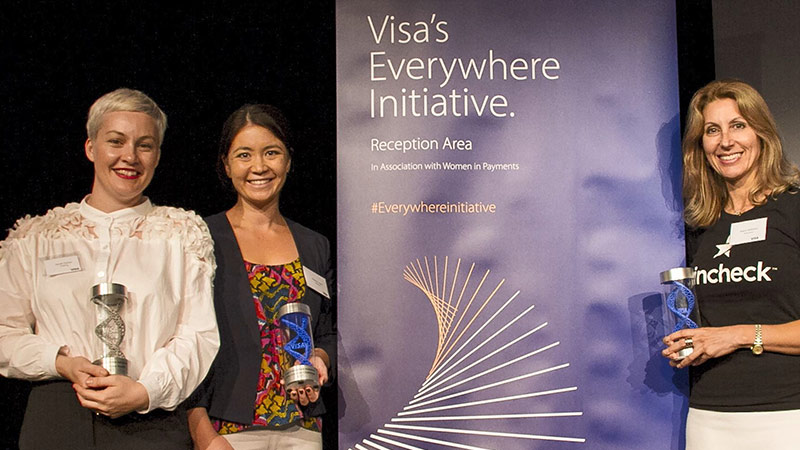 Three women pose with their trophies after winning Sydney's Visa Everywhere Initiative competition. 