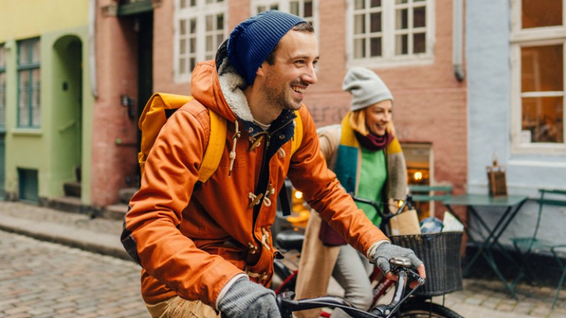 Two people cycling