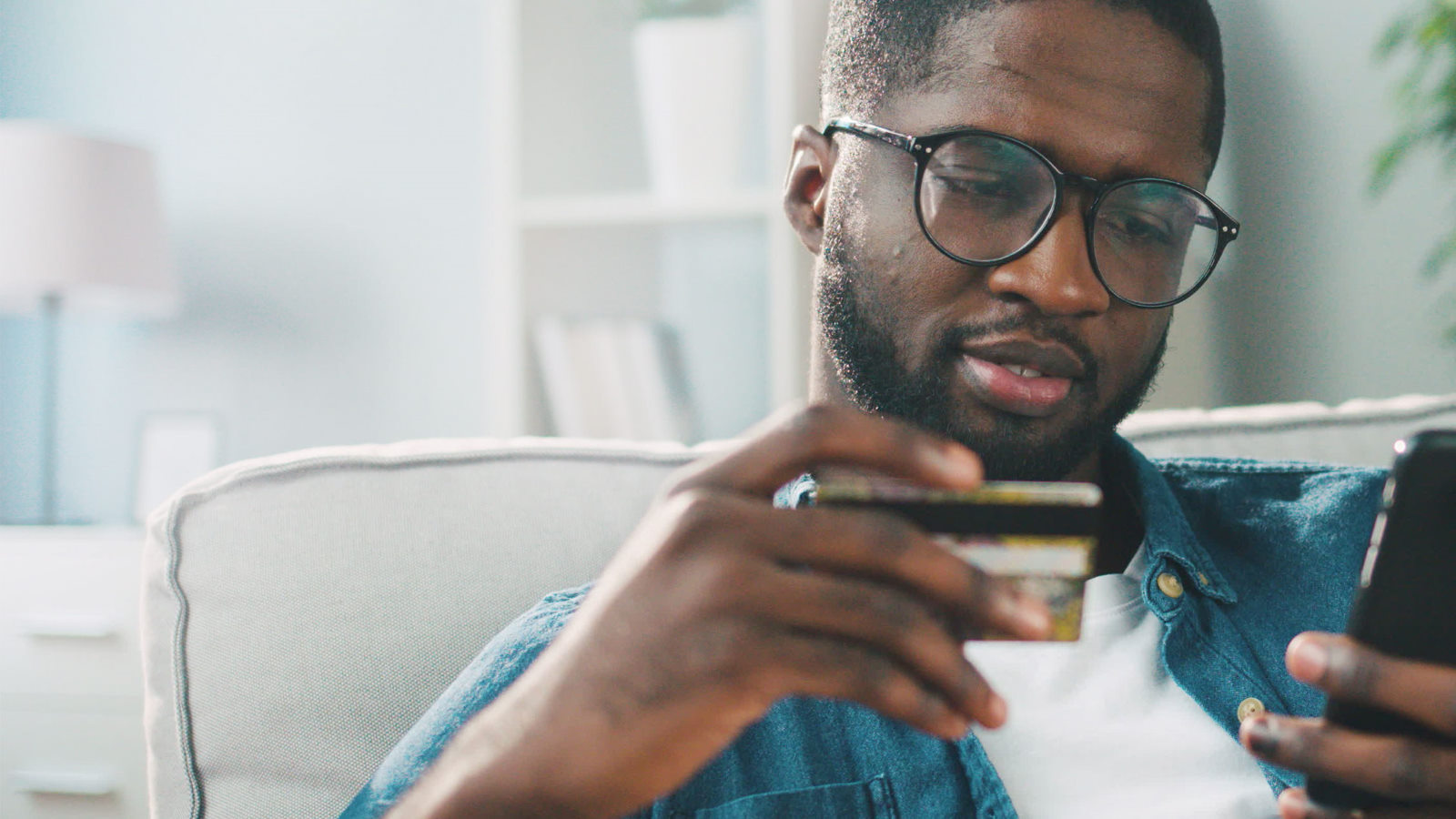 Person looking at card on phone