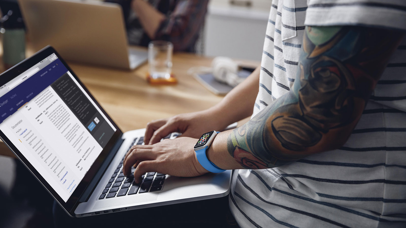 Person using laptop creating a website